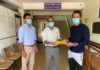 National-Skipper-Dimuth-Karunaratne-hands-over-the-grant-to-Dr.-Janitha-Hettiarachchi-Medical-Superintendent-of-the-Homagama-Base-Hospital