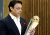 Shoaib Akhtar holding the Champions Trophy Cup