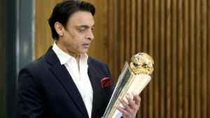 Shoaib Akhtar holding the Champions Trophy Cup