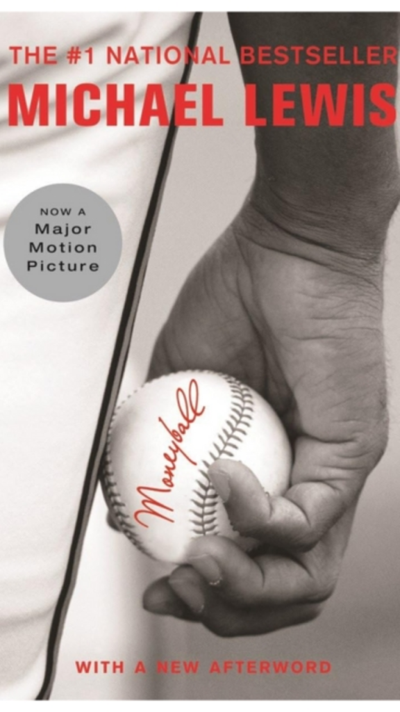 Cover of the book "Moneyball" by Michael Lewis, featuring a hand holding a baseball, labeled as a #1 national bestseller and adapted into a major motion picture.